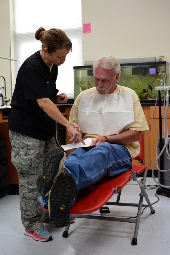 Air Force Staff Sgt. Deborah McCarthy, a dental technician from the 445th Aerospace Medicine Squadron of Wright-Patterson Air Force Base, Ohio, reviews a patient’s file during Innovative Readiness Training at Mountain Home, Ark., June 12, 2017. The IRT program allows active-duty, guard and reserve members to volunteer for real-world training opportunities through engineering, veterinarian, medical, and construction projects that benefit the sometimes-forgotten citizens of American communities in need. (U.S. Air National Guard photo by Staff Sgt. Carlynne DeVine)