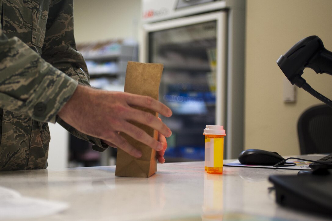 U.S. Air Force Capt. Brian Welch, 17th Medical Support Squadron pharmacist, prepares a prescription at the Ross Clinic on Goodfellow Air Force Base, Texas, June 15, 2017. Welch became interested in pharmacy while working as a cashier and then pharmacy technician in college. (U.S. Air Force photo by Senior Airman Scott Jackson/released)