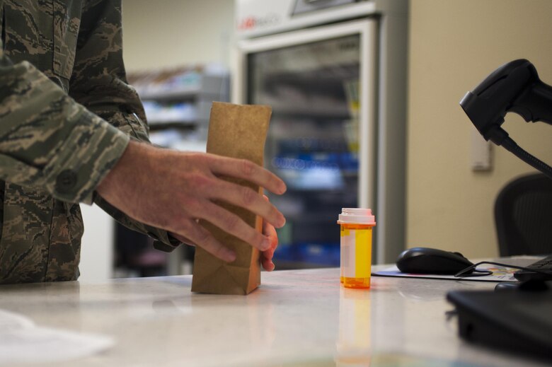 U.S. Air Force Capt. Brian Welch, 17th Medical Support Squadron pharmacist, prepares a prescription at the Ross Clinic on Goodfellow Air Force Base, Texas, June 15, 2017. Welch became interested in pharmacy while working as a cashier and then pharmacy technician in college. (U.S. Air Force photo by Senior Airman Scott Jackson/released)