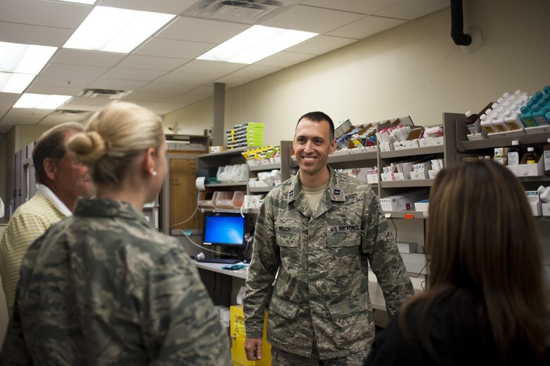 U.S. Air Force Capt. Brian Welch, 17th Medical Support Squadron pharmacist, talks to the pharmacy staff at the Ross Clinic on Goodfellow Air Force Base, Texas, June 15, 2017. Welch was nominated by the Pharmacist Times magazine for the Rising Star award. (U.S. Air Force photo by Senior Airman Scott Jackson/released)