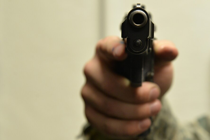 Senior Airman Tyler Merrill, 341st Security Forces Support Squadron armorer, holds a weapon June 14, 2017, at Malmstrom Air Force Base, Mont. The firearm’s muzzle should always be pointed in a safe direction away from others. (U.S. Air Force photo/Airman 1st Class Daniel Brosam)
