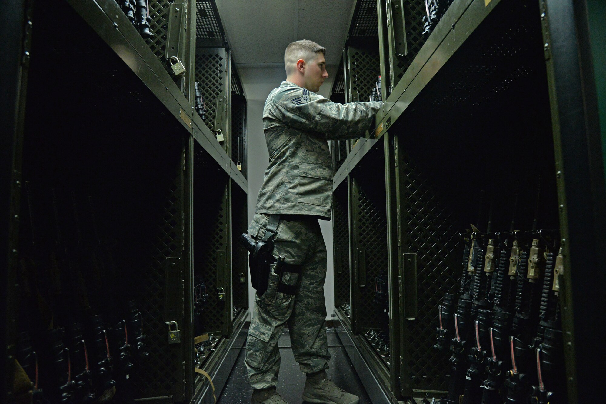 Senior Airman Tyler Merrill, 341st Security Forces Support Squadron armorer, inspects weapons June 14, 2017, at Malmstrom Air Force Base, Mont. Individuals may store their firearms in the security forces armory located in Building 500. (U.S. Air Force photo/Airman 1st Class Daniel Brosam)
