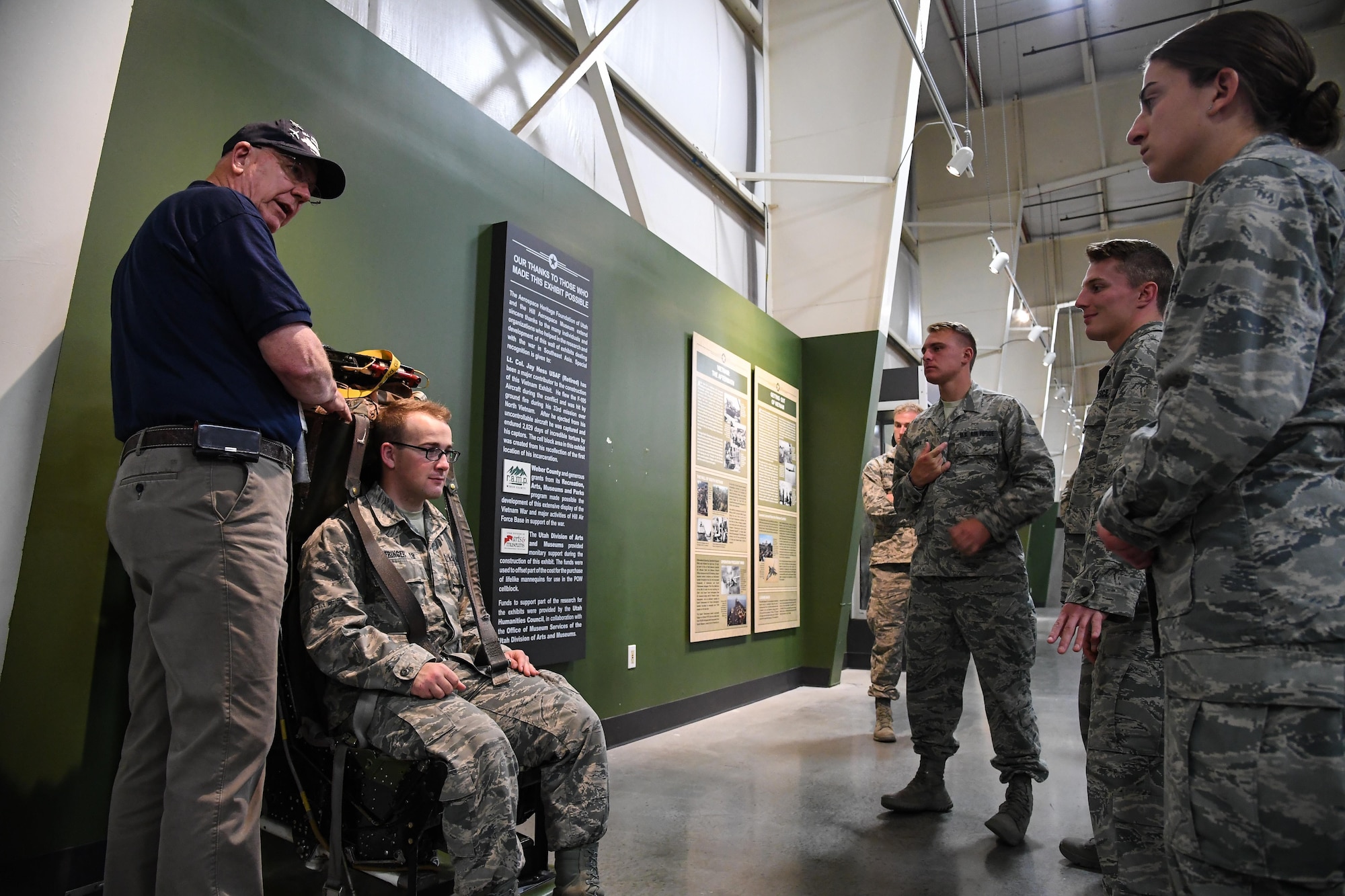 Volunteer docent Christopher Black speaks to U.S. Air Force Academy Cadets during a tour of the Hill Air Force Base Aerospace Museum, June 9, 2017. Ops AF is as a requirement for graduation and Hill AFB is one of the 60 continental United States bases working with the Academy to make this program possible. (U.S. Air Force photo/R. Nial Bradshaw)
