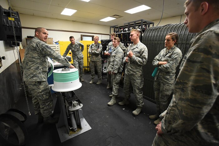 Tech. Sgt. Robert Pulley, 388th Maintenance Squadron, speaks to U.S. Air Force Academy Cadets during their tour of the 388th MXS Wheel Shop, Hill Air Force Base, Utah, June 14, 2017. Future Air Force officers visited Hill AFB as part of an annual program that introduces them to the experiences they’ll likely have at an operational base after graduation. (U.S. Air Force photo/R. Nial Bradshaw)