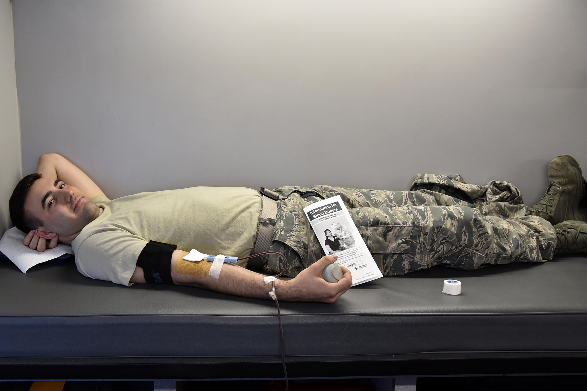Staff Sgt. Jose Bulls, financial management systems administrator in the 175th Comptroller Flight, participates in a blood drive June 15, 2017 at Warfield Air National Guard Base, Middle River, Md. This is Bulls’ third time donating blood on base. (U.S. Air National Guard photo by Airman Sarah M. McClanahan)