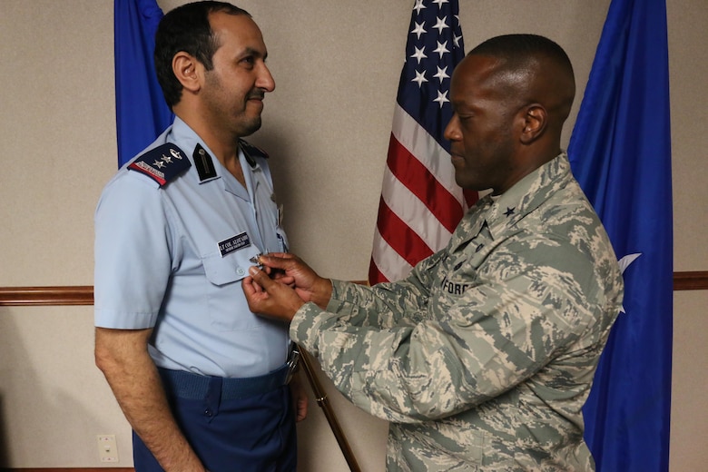 Royal Saudi Air Force Senior Country Liaison Officer, Bader Alotaibi, is promoted to Colonel as Brig. Gen. Ronald Jolly, 82nd Training Wing commander, pins on his rank, June 14, 2017. RSAF students train at Sheppard Air Force Base in a variety of F-15 Strike Eagle maintenance courses. (U.S. Air Force courtesy photo)