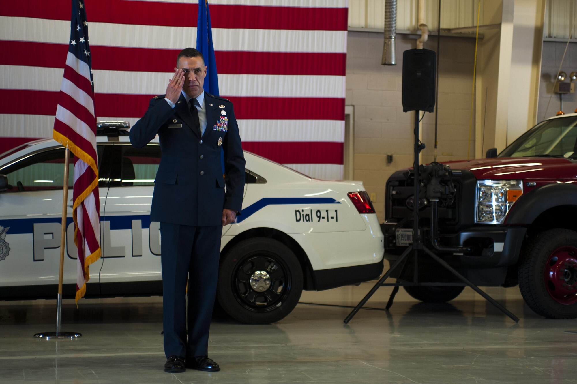U.S. Air Force Col. Jason Beck, 17th Training Group Commander, salutes the group for the first time as commander at the Logistics and Readiness High Bay on Goodfellow Air Force Base, Texas, June 16, 2017. Beck previously served the Branch Chief of Antiterrorism Plans and Programs at Headquarters United States Pacific Command. (U.S. Air Force photo by Senior Airman Scott Jackson/Released)