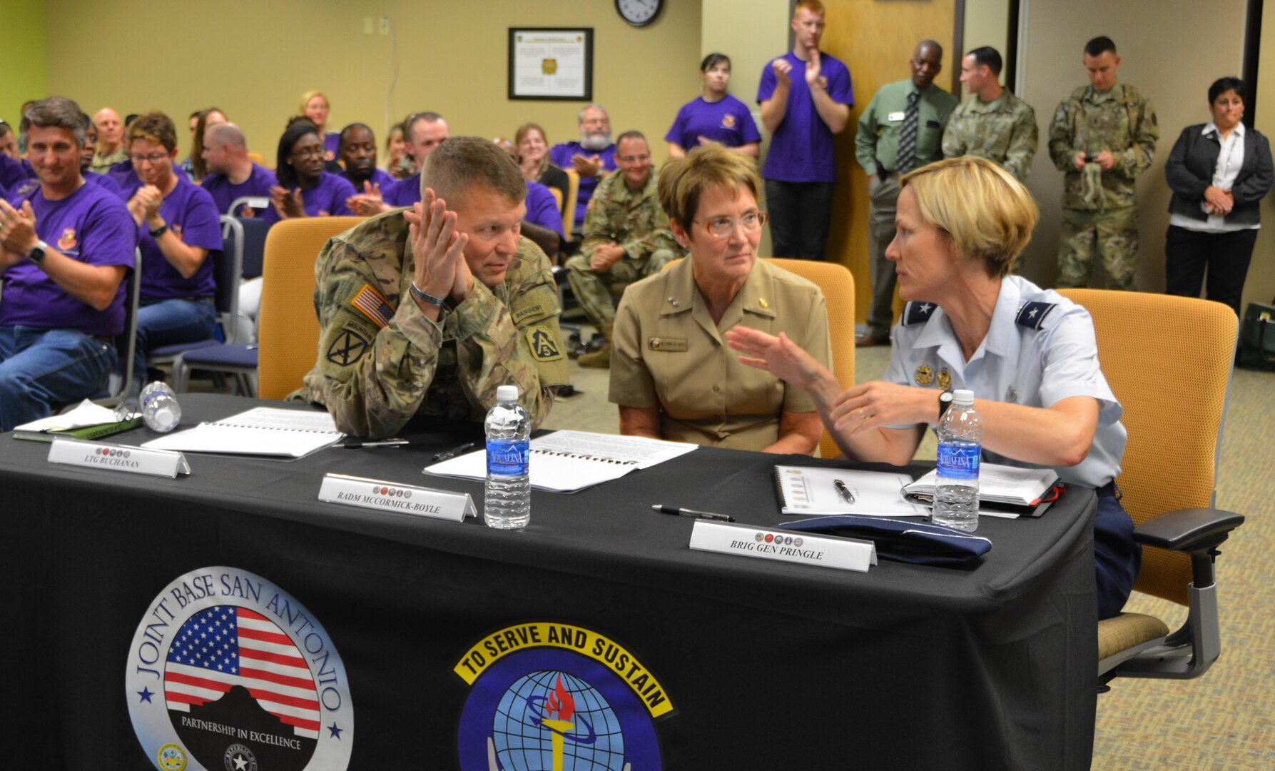 (From left) The local senior leadership panel of Army Lt. Gen. Jeffrey S. Buchanan, U.S. Army North (Fifth Army) commanding general and; Navy Rear Adm. Rebecca McCormick-Boyle, commander, Navy Medicine Education and Training Command; and Air Force Brig. Gen. Heather L. Pringle, commander, 502nd Air Base Wing and Joint Base San Antonio, discuss the issues presented amongst each other during the fiscal year 2017 Joint Base San Antonio Armed Forces Action Plan, or AFAP, Forum, Nov. 3, 2016.