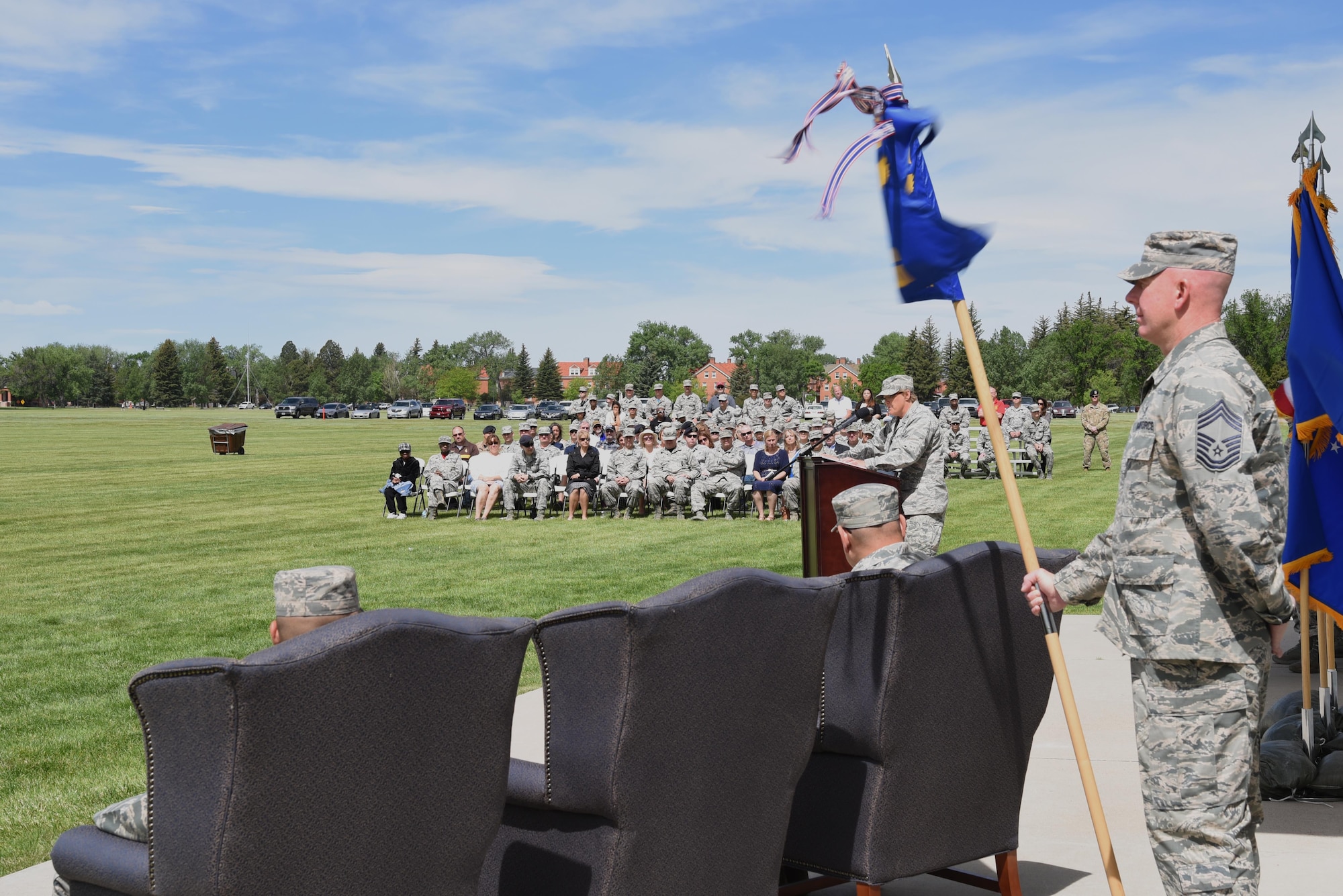 Colonel Tricia Van Den Top, 90th Mission Support Group commander, speaks to the crowd attending the 90th MSG Change of Command June 16, 2017, on the Argonne Parade Field at F.E. Warren Air Force Base, Wyo. The group is comprised of the 90th Logistics Readiness Squadron, 90th Civil Engineer Squadron, 90th Force Support Squadron, 90th Communications Squadron and 90th Contracting Squadron, which provide essential support functions to the 90th Missile Wing’s mission. (U.S. Air Force photo by Glenn S. Robertson)