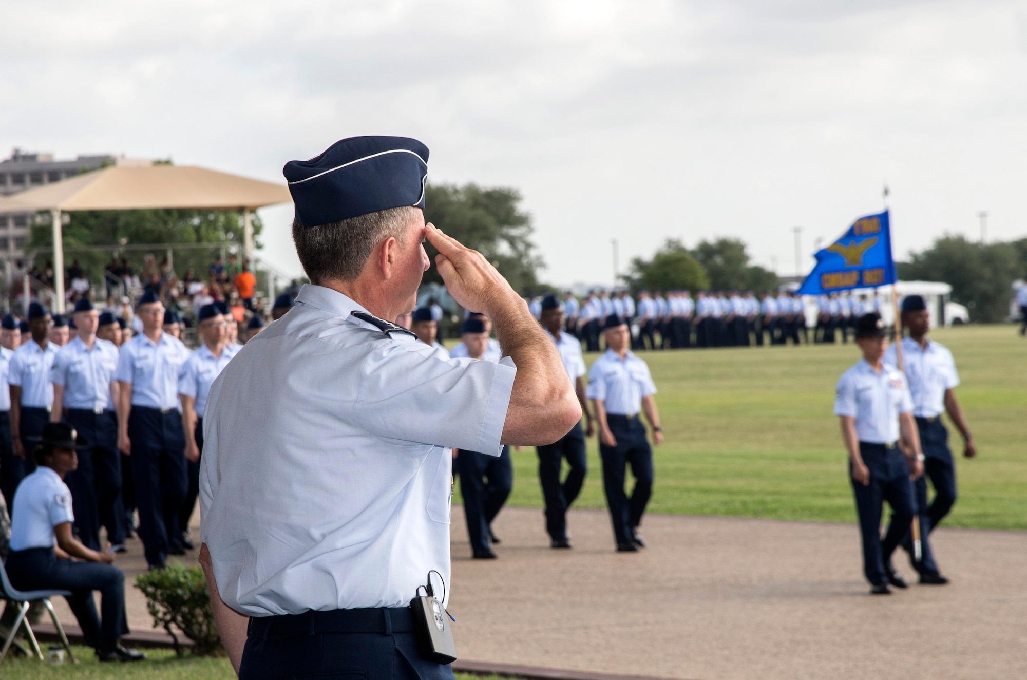 Air Force Chief of Staff Gen. David Goldfein salutes a flight of the Air Force's newest Airmen June 16, 2017, at Joint Base San Antonio-Lackland. Goldfein toured various JBSA-Lackland facilities and met many 37th Training Wing Airmen during his two-day visit. Every enlisted Airmen begins their Air Force career at basic military training. JBSA-Lackland is often referred to as the "Gateway to the Air Force," graduating about 39,000 Airmen annually. Basic military training is one of the missions of the 37th Training Wing, the largest training wing in the United States Air Force. (U.S. Air Force photo by Johnny Saldivar)