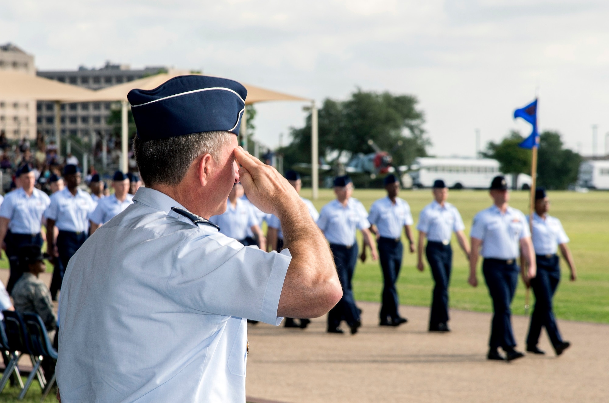 Air Force Chief of Staff Gen. David Goldfein salutes a flight of the Air Force's newest Airmen June 16, 2017, at Joint Base San Antonio-Lackland. Goldfein toured various JBSA-Lackland facilities and met many 37th Training Wing Airmen during his two-day visit. Every enlisted Airmen begins their Air Force career at basic military training. JBSA-Lackland is often referred to as the "Gateway to the Air Force," graduating about 39,000 Airmen annually. Basic military training is one of the missions of the 37th Training Wing, the largest training wing in the United States Air Force. (U.S. Air Force photo by Johnny Saldivar)