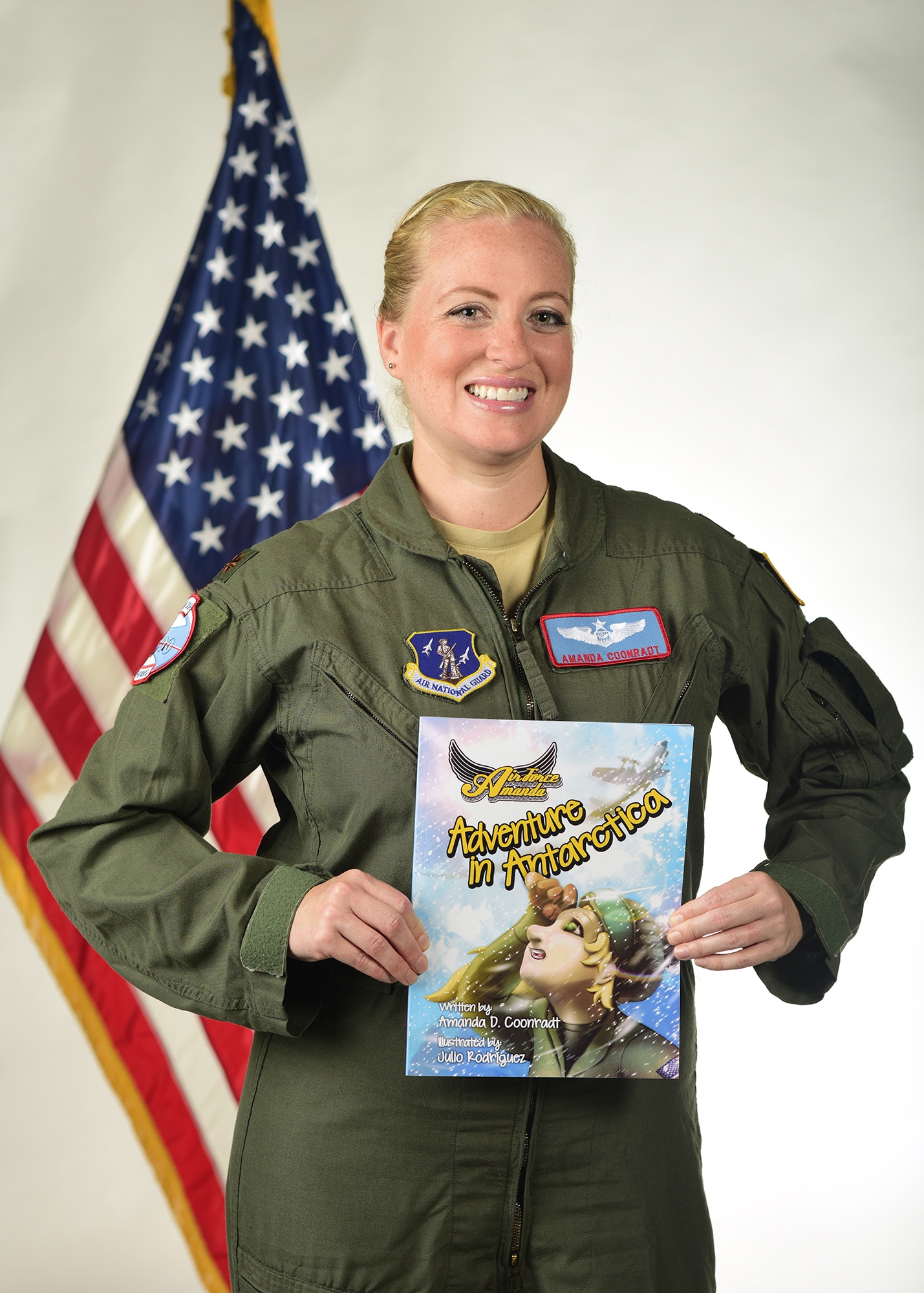 Maj. Amanda Coonradt, an LC-130 Skibird navigator with the 109th Airlift Wing, recently self-published a children's book, "Air Force Amanda: Adventure in Antarctica." The book talks about Antarctica through the perspective of an LC-130 navigator. (U.S. Air National Guard photo by Staff Sgt. Benjamin German/Released)