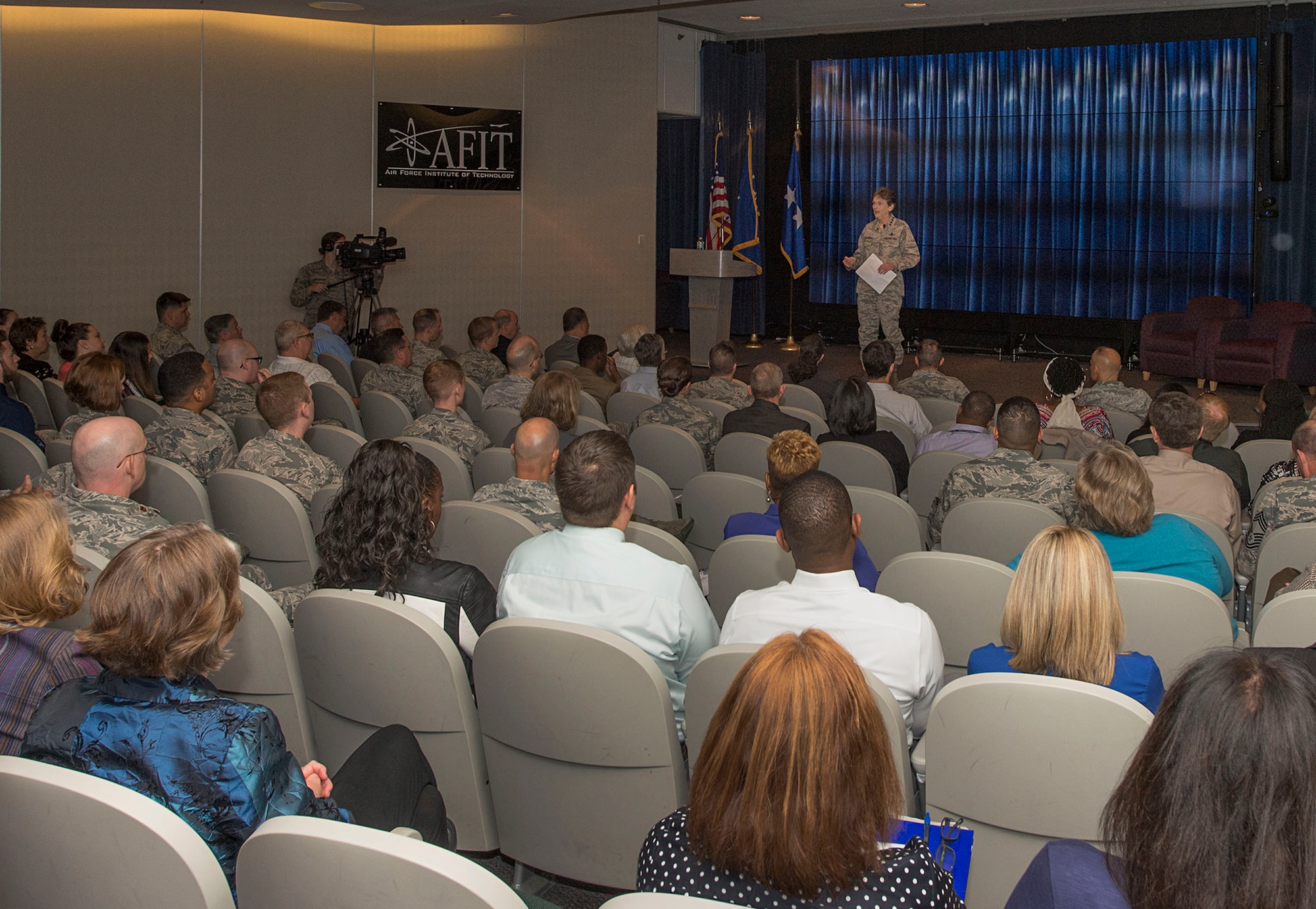 Gen. Ellen Pawlikowski, commander of Air Force Materiel Command, provides remarks at the Air Force Installation Contracting Agency’s 2017 Enterprise Sourcing Summit June 8 at the Air Force Institute of Technology’s Bane Auditorium. The AFMC commander praised the ongoing effort to provide cost-effective and agile acquisition support to the Air Force. Attendees included representatives from the operational contracting, small business, civil engineering, and acquisition communities, among others. (U.S. Air Force photo/Michelle Gigante)