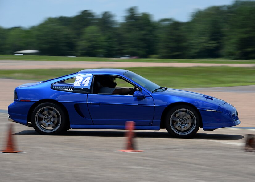 Mike Orzel, driver, takes a turn on the flightline track June 10, 2017, on Columbus Air Force Base, Mississippi. Some cones were placed sideways to indicate to the drivers which side to turn around. (U.S. Air Force photo by Airman 1st Class Keith Holcomb)

