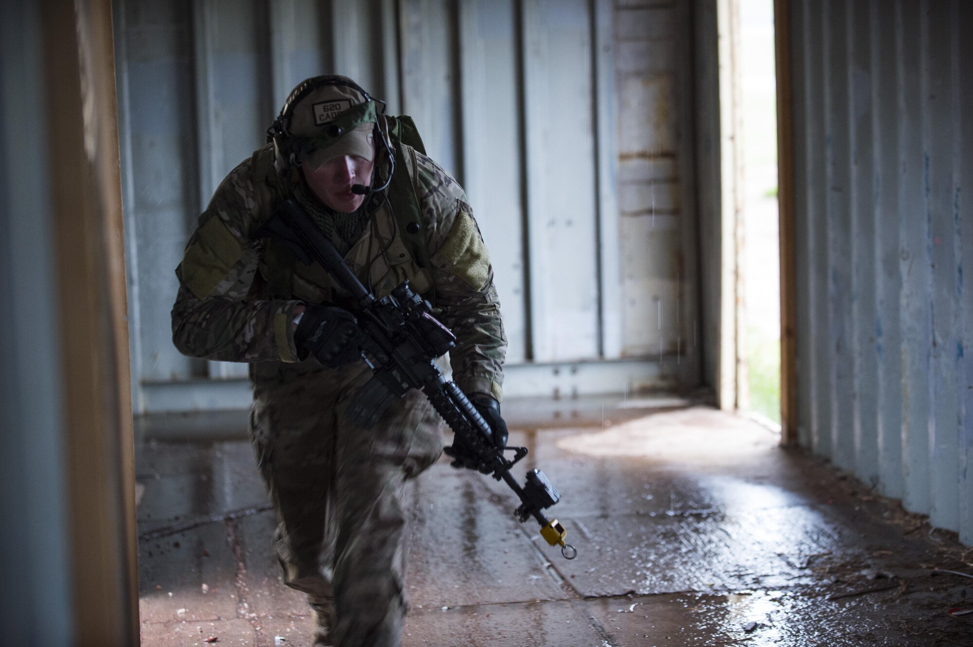 Staff Sgt. Samuel Saintz, 620th Ground Combat Training Squadron formal training instructor, scurries through a facility to get into a fighting position during the 2017 Global Strike Challenge at Camp Guernsey, Wyo., May 18, 2017. The winners from each challenge will be announced in August at the 2017 Global Strike Command Innovation and Technology Symposium in Shreveport, La. (U.S. Air Force photo by Staff Sgt. Christopher Ruano)