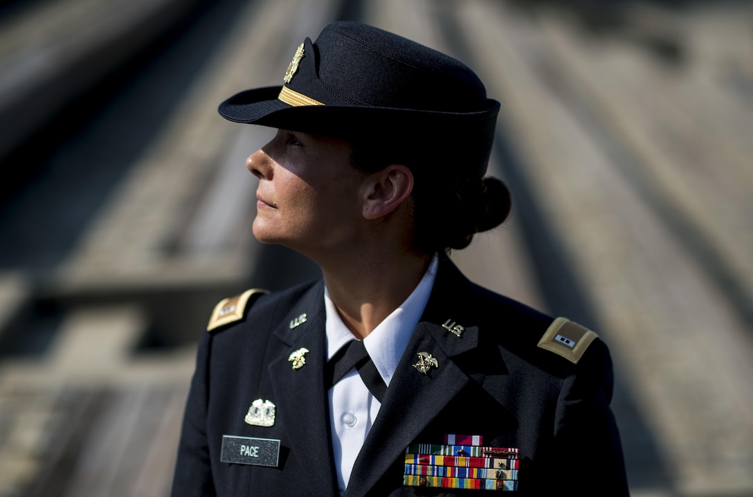 Chief Warrant Officer 2 Jennifer Pace poses for a portrait in Baltimore, Maryland, June 15, where she used to work as a police officer before committing her career full time to the U.S. Army Reserve. Pace is among this year's recipients of the General Douglas MacArthur Leadership Award, which she won as a property book officer while working for the 290th Military Police Brigade, headquartered in Nashville, Tennessee. In her leadership journey and professional growth, Pace overcame the loss of her brother, Danny Gamez, who passed away in 2011. (U.S. Army Reserve photo by Master Sgt. Michel Sauret)