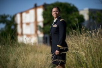 Chief Warrant Officer 2 Jennifer Pace poses for a portrait in West Baltimore, Maryland, June 15, where she used to work as a police officer before committing her career full time to the U.S. Army Reserve. Pace is among this year's recipients of the General Douglas MacArthur Leadership Award, which she won as a property book officer while working for the 290th Military Police Brigade, headquartered in Nashville, Tennessee. In her leadership journey and professional growth, Pace overcame the loss of her brother, Danny Gamez, who passed away in 2011. (U.S. Army Reserve photo by Master Sgt. Michel Sauret)