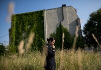 Chief Warrant Officer 2 Jennifer Pace poses for a portrait in West Baltimore, Maryland, June 15, where she used to work as a police officer before committing her career full time to the U.S. Army Reserve. Pace is among this year's recipients of the General Douglas MacArthur Leadership Award, which she won as a property book officer while working for the 290th Military Police Brigade, headquartered in Nashville, Tennessee. In her leadership journey and professional growth, Pace overcame the loss of her brother, Danny Gamez, who passed away in 2011. (U.S. Army Reserve photo by Master Sgt. Michel Sauret)