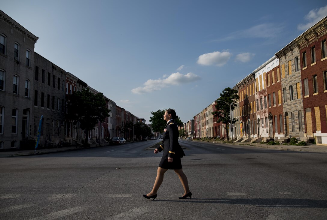 Chief Warrant Officer 2 Jennifer Pace poses for a portrait in West Baltimore, Maryland, June 15, where she used to work as a police officer before committing her career full time to the U.S. Army Reserve. Pace is among this year's recipients of the General Douglas MacArthur Leadership Award, which she won as a property book officer while working for the 290th Military Police Brigade, headquartered in Nashville, Tennessee. In her leadership journey and professional growth, Pace overcame the loss of her brother, Danny Gamez, who passed away in 2011. (U.S. Army Reserve photo by Master Sgt. Michel Sauret)
