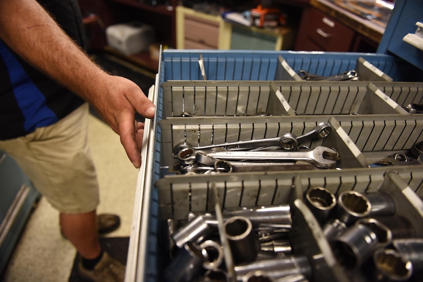 Jason Allston, Auto Skills Center sales clerk, retrieves a tool for a customer in the ASC at Joint Base Charleston, S.C. June 15, 2017. The ASC has 12 bays, nine with lifts, two flat bays and one motorcycle bay. Their rates are $5 per hour for the flat bays and $8 per hour for the lift bays.