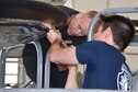 DAYTON, Ohio (06/2017) -- (From left to right) Restoration Specialists Brian Lindamood and Casey Simmons work on the B-17F &quot;Memphis Belle&quot;™ in the restoration hangar at the National Museum of the U.S. Air Force. The exhibit opening for this aircraft is planned for May 17, 2018.(U.S. Air Force photo by Ken LaRock)