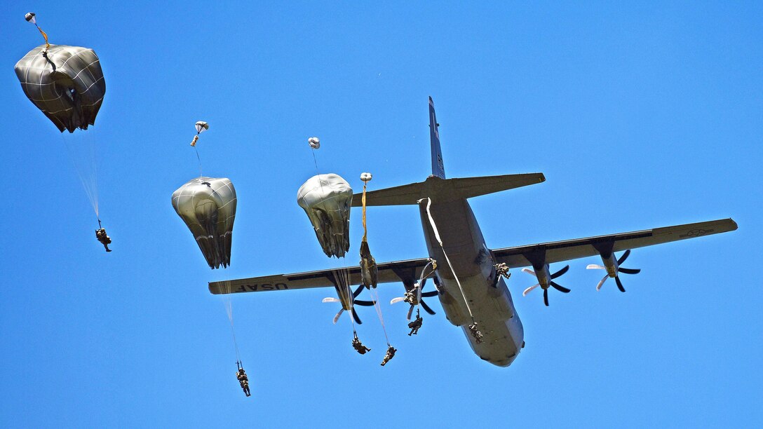 Army paratroopers jump from an Air Force C-130 Hercules over the Juliet drop zone in Pordenone, Italy, June 8, 2017. The soldiers are assigned to the 2nd Battalion, 503rd Infantry Regiment. Army photo by Davide Dalla Massara