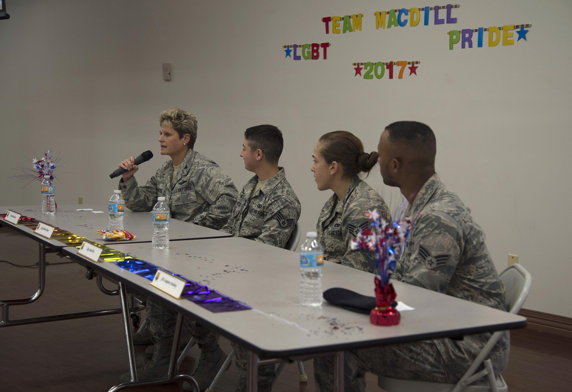 U.S. Air Force Col. Jennifer Barrett, vice commander of the 6th Air Mobility Wing, speaks as a panel member during a Pride Luncheon at MacDill Air Force Base, Fla., June 15, 2017. The purpose of the luncheon was to increase education throughout the wing in regards to Pride Month and the lesbian, gay, bisexual, and transgender community. (U.S. Air Force Photo by Airman 1st Class Ashley Perdue)