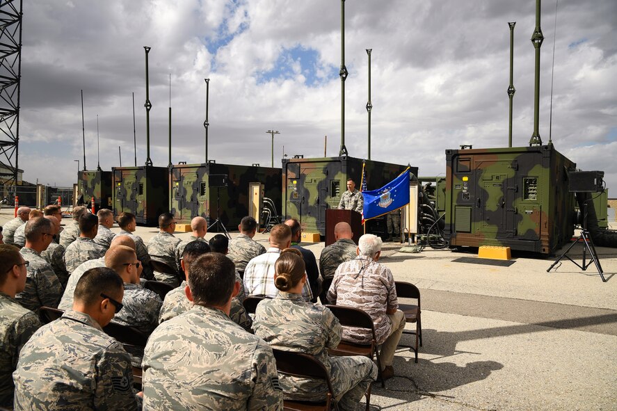 Tech. Sgt. Phillip Lowery, 729th ACS deployed radar links NCO in charge, speaks during the AN/TYQ-23 decommissioning ceremony, Hill Air Force Base, Utah, June 12, 2017. The decommissioned equipment is being replaced with a highly transportable, updated rapid reaction mobile Air Control System. (U.S. Air Force photo/R. Nial Bradshaw)