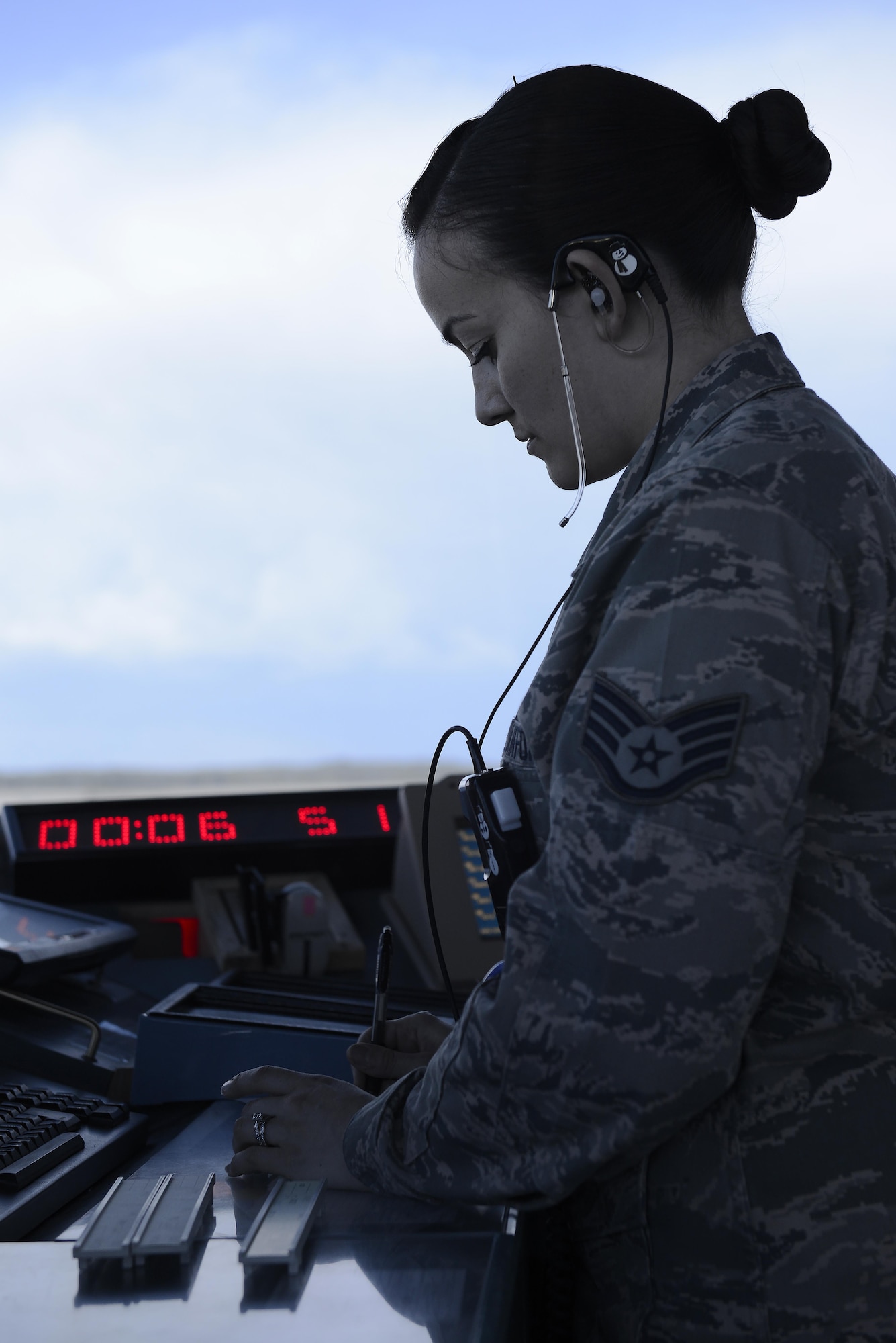 U.S. Air Force Staff Sgt. Amanda Ahsoak, air traffic control journeyman, checks flight plans for aircraft arriving at Joint Base Elmendorf-Richardson, Alaska, June 15, 2017. ATC Airmen are responsible for the safety and control of hundreds of military and civilian aircraft every day. 