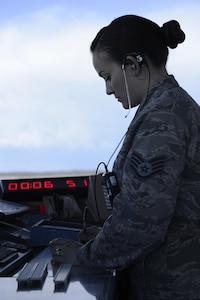 U.S. Air Force Staff Sgt. Amanda Ahsoak, air traffic control journeyman, checks flight plans for aircraft arriving at Joint Base Elmendorf-Richardson, Alaska, June 15, 2017. ATC Airmen are responsible for the safety and control of hundreds of military and civilian aircraft every day. 