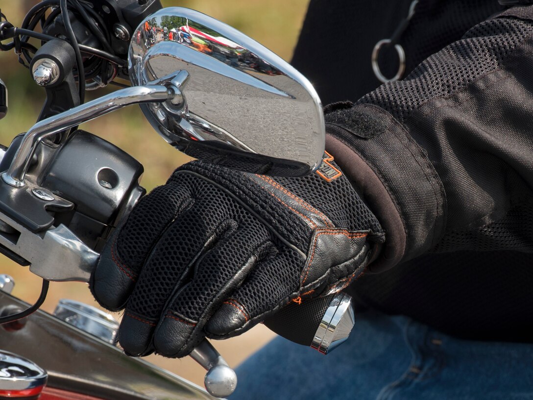 A motorcyclist grips their motorbike handle during the Seventh Annual Motorcycle Safety Day at Joint Base Andrews, Md., June 15, 2017. The event provided demonstrations and safety tips to help reduce accidents among riders. (U.S. Air Force photo by Airman 1st Class Valentina Lopez)