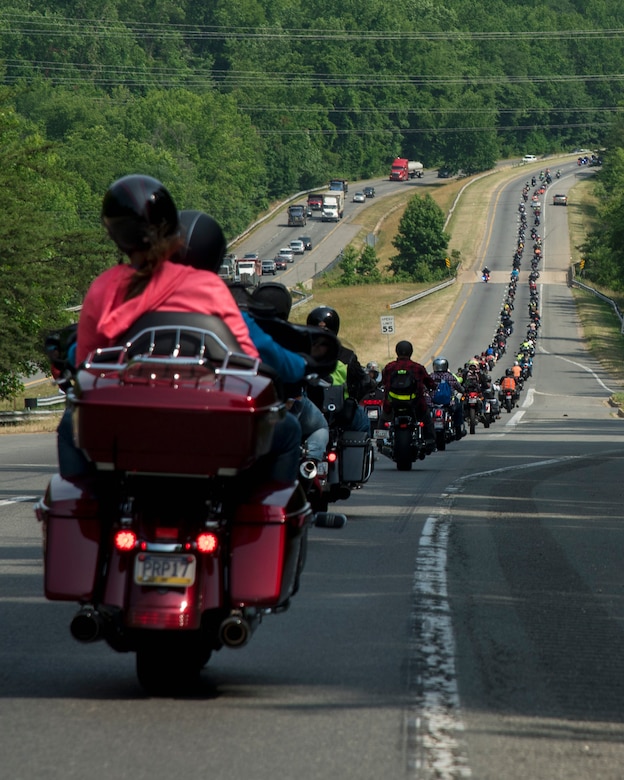 Motorcyclists take part in a police-escorted off-base ride around Maryland during Joint Base Andrews’ Seventh Annual Motorcycle Safety Day, June 15, 2017. The event included riding competitions, guest speakers, live entertainment, a crash simulator, prize giveaways, food and the opportunity to meet with local motorcycle dealers and riding groups. (U.S. Air Force photo by Airman 1st Class Valentina Lopez)