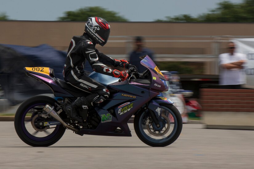 Will Moore, professional motorcycle racer, demonstrates safety maneuvers during the Seventh Annual Motorcycle Safety Day at Joint Base Andrews, Md., June 15, 2017. The day included various demonstrations to educate and spread awareness to JBA members about safe riding practices. (U.S. Air Force photo by Airman 1st Class Valentina Lopez)