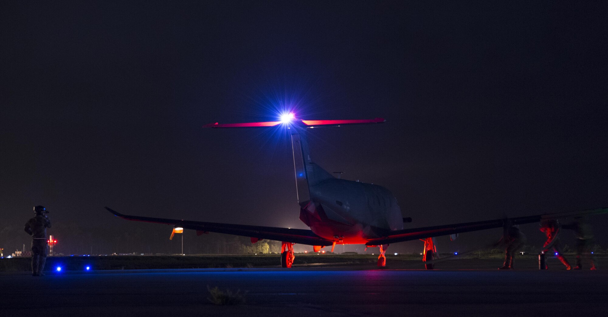 Air Commandos with the 1st Special Operations Logistics Readiness Squadron prepare to refuel a Pilatus PC-12 assigned to the 319th Special Operations Squadron during a forward area refueling point operation at Hurlburt Field, Fla., June 13, 2017. Forward area refueling points enable global reach and mission accomplishment. (U.S. Air Force photo by Airman 1st Class Joseph Pick)