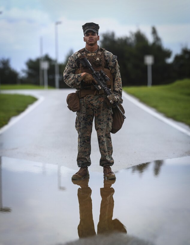 Lance Cpl. James J. Beck, a rifleman assigned to Alpha Company, 1st Battalion, 3rd Marine Regiment, poses for a portrait prior to conducting Battlesight Zero on his M4A1 carbine at Range 1 aboard Camp Hansen, Okinawa, Japan, June 14, 2017. The Hawaii-based battalion is forward deployed to Okinawa, Japan as part of the Unit Deployment Program.