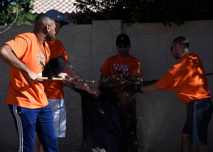 Airmen assigned to the 56th Medical Group cleans up the Fallen Feathers Wildlife Rescue operation center June 16, 2017 at Peoria, Ariz. The Luke Service Blitz featured more than 3,000 Airmen that volunteered at over 100 locations Valley-wide. Airmen spent the day giving back to organizations such as homeless shelters, community parks and trails, as well as foodbanks and animal shelters. (U.S. Air Force photo by Senior Airman Devante Williams)