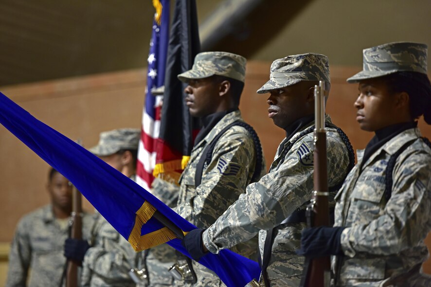 407th Air Expeditionary Group Honor Guard presents the colors during a change of command ceremony June 17, 2017, in Southwest Asia. The change of command ceremony was for Col. John Gonzales to assume command over the 407th AEG from Col. David Lyons. (U.S. Air Force photo by Senior Airman Ramon A. Adelan)