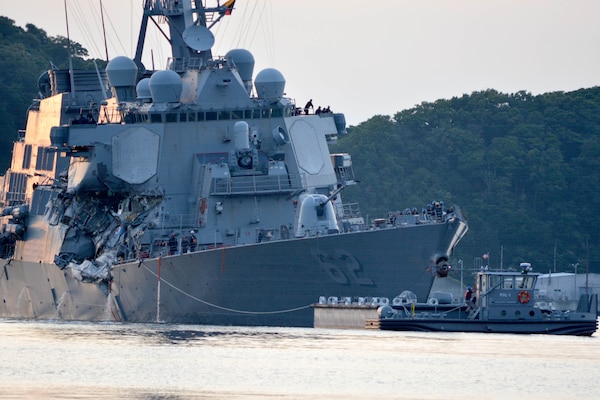 The Arleigh Burke-class guided-missile destroyer USS Fitzgerald returns to Fleet Activities Yokosuka following a collision with a merchant vessel while operating southwest of Yokosuka, Japan. Navy photo by Petty Officer 1st Class Peter Burghart
