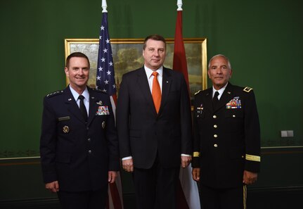 Air Force Gen. Joseph Lengyel, chief, National Guard Bureau; President Raimonds Vejonis, president of Latvia; and Army Maj. Gen. Greg Vadnais, adjutant general, Michigan National Guard, in Riga, Latvia, June 12, 2017. 