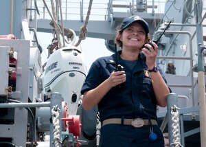 Lt. Cmdr. Rebecca Wolf, USS Gladiator's (MCM 11) executive officer, maintains radio contact with crew onboard the Gladiator during shipboard operations in the Arabian Gulf. Gladiator, one of four MCM ships forward deployed to Bahrain and attached to U.S. Naval Forces Central Command's Task Force 52, is a mine sweeper/hunter-killer capable of finding, classifying and destroying mines preserve the freedom of navigation and the free flow of commerce in the U.S. 5th Fleet area of operations. 