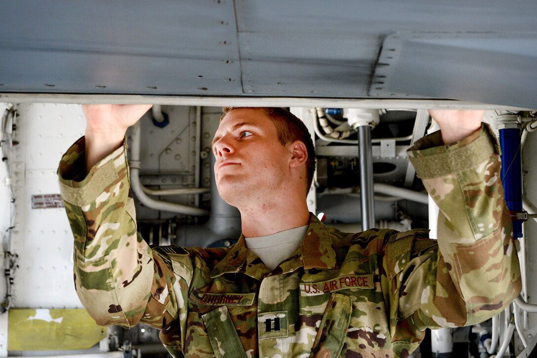 Air Force Capt. Christopher Chorney inspects a KC-135 Stratotanker before a flight in support of Operation Inherent Resolve at Al Udeid Air Base, Qatar, June 9, 2017. Chorney is a pilot assigned to the 340th Expeditionary Air Refueling Squadron. Air Force photo by Staff Sgt. Michael Battles