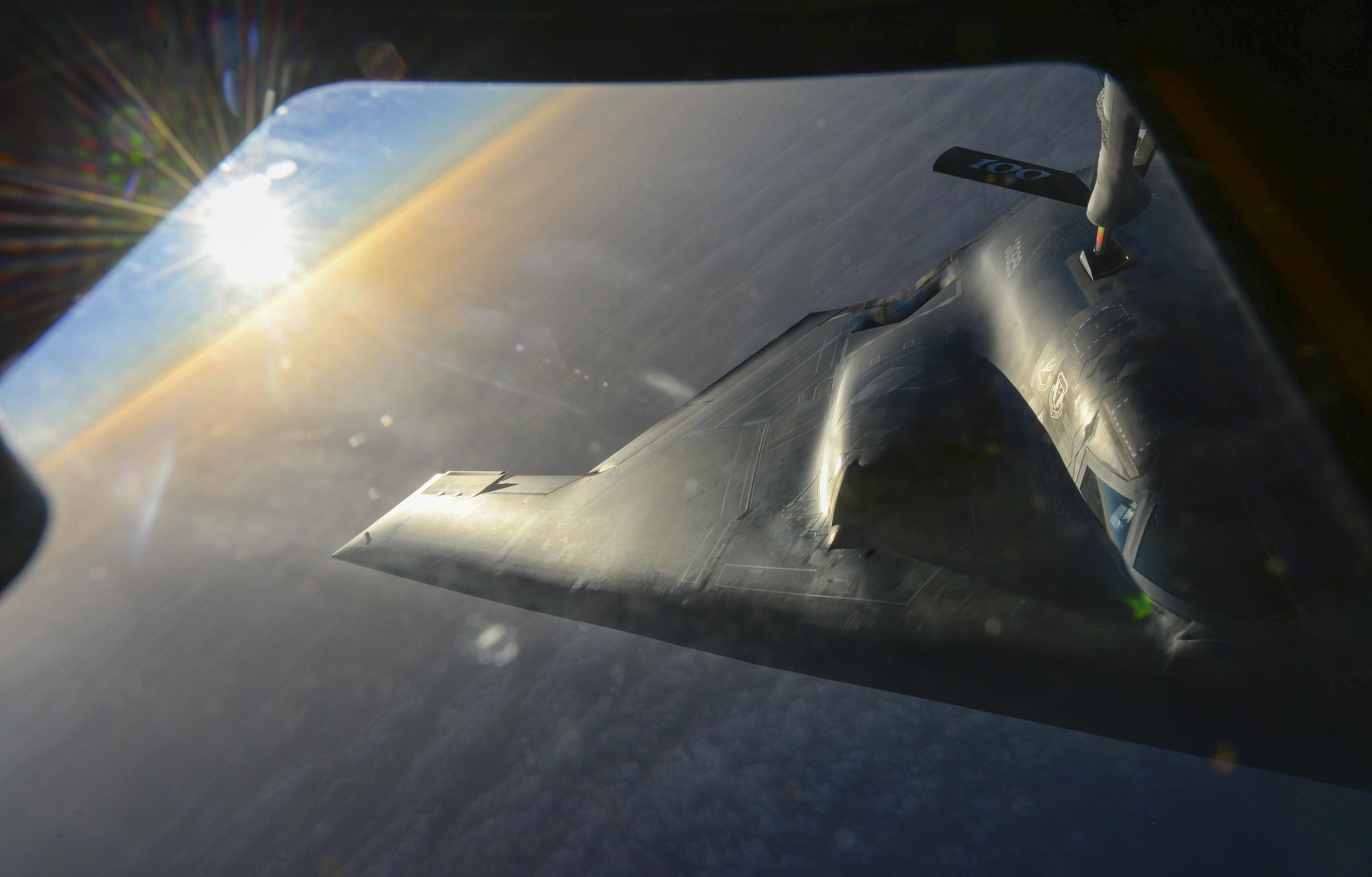 A U.S. Air Force KC-135 Stratotanker assigned to the 100th Air Refueling Wing, RAF Mildenhall, England, transfers fuel to a B-2 Spirit from Whiteman Air Force Base, Mo., off the coast of Spain, June 13, 2017. The B-2's low observability is derived from a combination of reduced infrared, acoustic, electromagnetic, visual and radar signatures. These signatures make it difficult for sophisticated defensive systems to detect, track and engage the B-2. (U.S. Air Force photo by Staff Sgt. Micaiah Anthony)