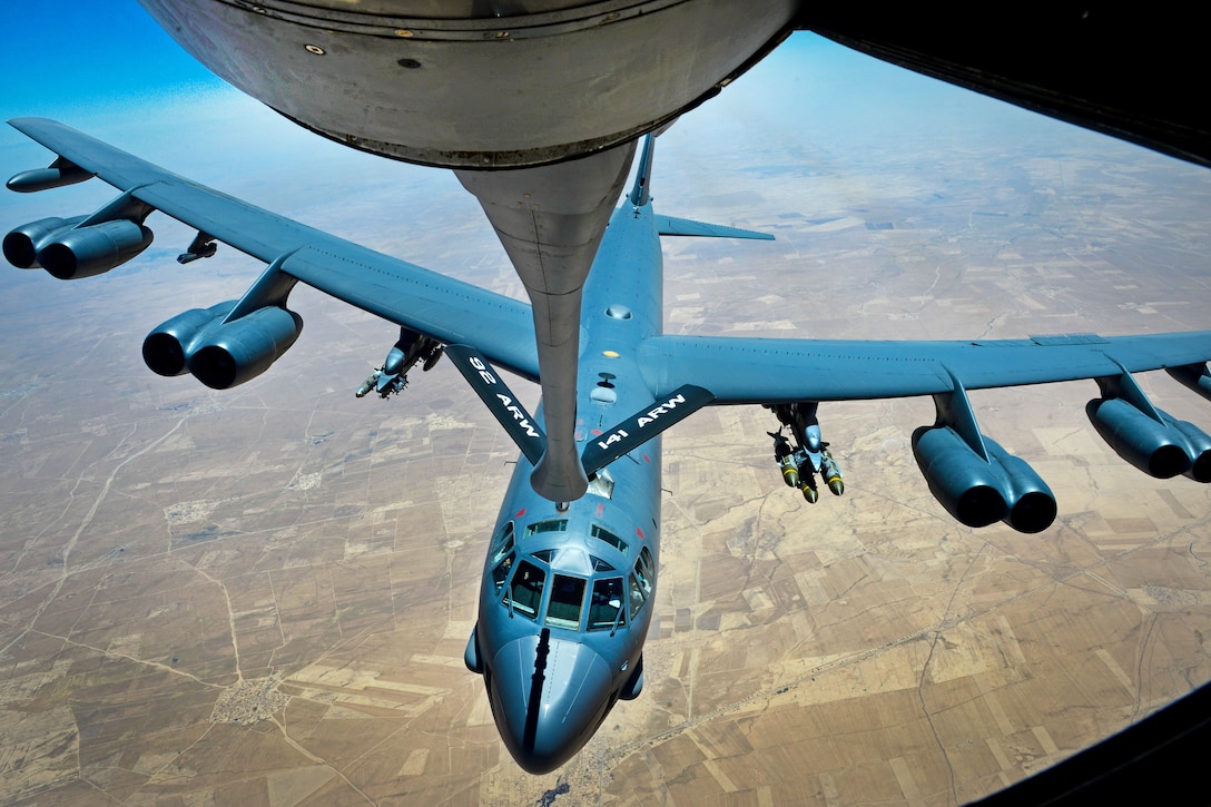 An Air Force B-52 Stratofortress bomber separates from a boom after receiving fuel from a KC-135 Stratotanker during a flight in support of Operation Inherent Resolve, June 9, 2017. Air Force photo by Staff Sgt. Michael Battles
