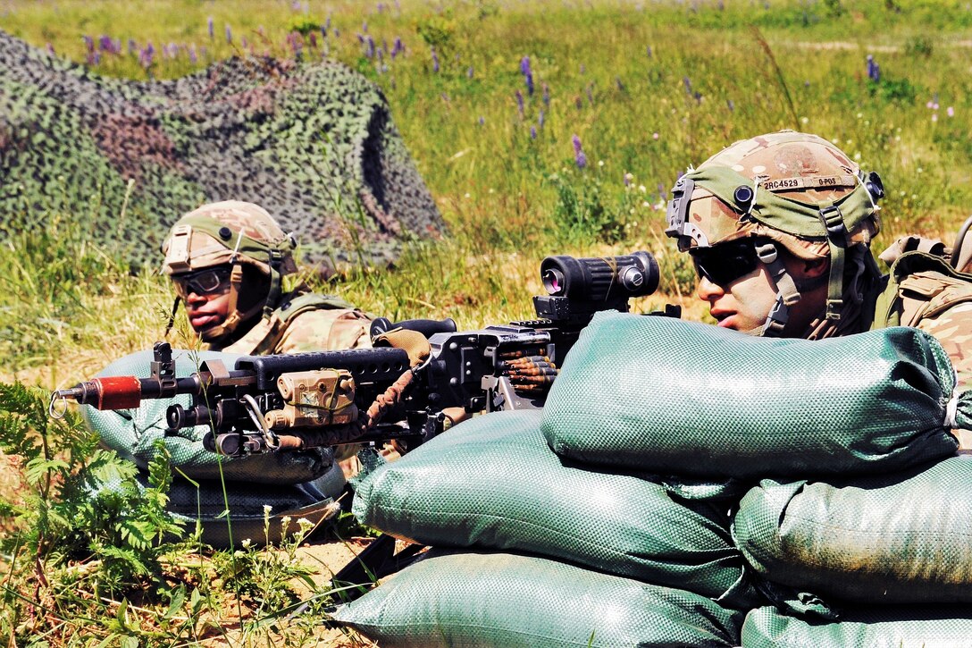 Soldiers provide security as part of a multinational field training during exercise Saber Strike 17 in Bemowo Piskie, Poland, June 14, 2017. Army photo by Charles Rosemond 