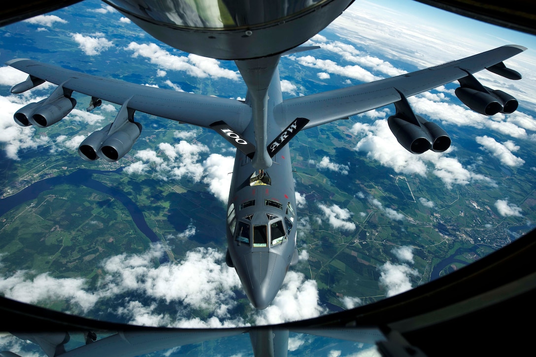 A B-52H Stratofortress bomber receives fuel from a KC-135R Stratotanker during Baltic Operations 2017 over Latvia, June 14, 2017. The Stratofortress crew is assigned to the 2nd Bomb Wing. Air Force photo by Staff Sgt. Jonathan Snyder 