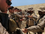 U.S. Marines with Charlie Company, 1st Battalion, 7th Marine Regiment, Special Purpose Marine Air-Ground Task Force-Crisis Response-Central Command, exchange gifts with Saudi Arabian Naval Special Forces at the end of a subject matter expert exchange while forward deployed in the Middle East, May 18, 2017. The exchange proved to be an enhancing opportunity for both the U.S. and Saudi forces. Deploying U.S. Marines into the U.S. Central Command area of responsibility to conduct combined military training with our partner nations’ security forces strengthens our vital relationships with partners in this important region.