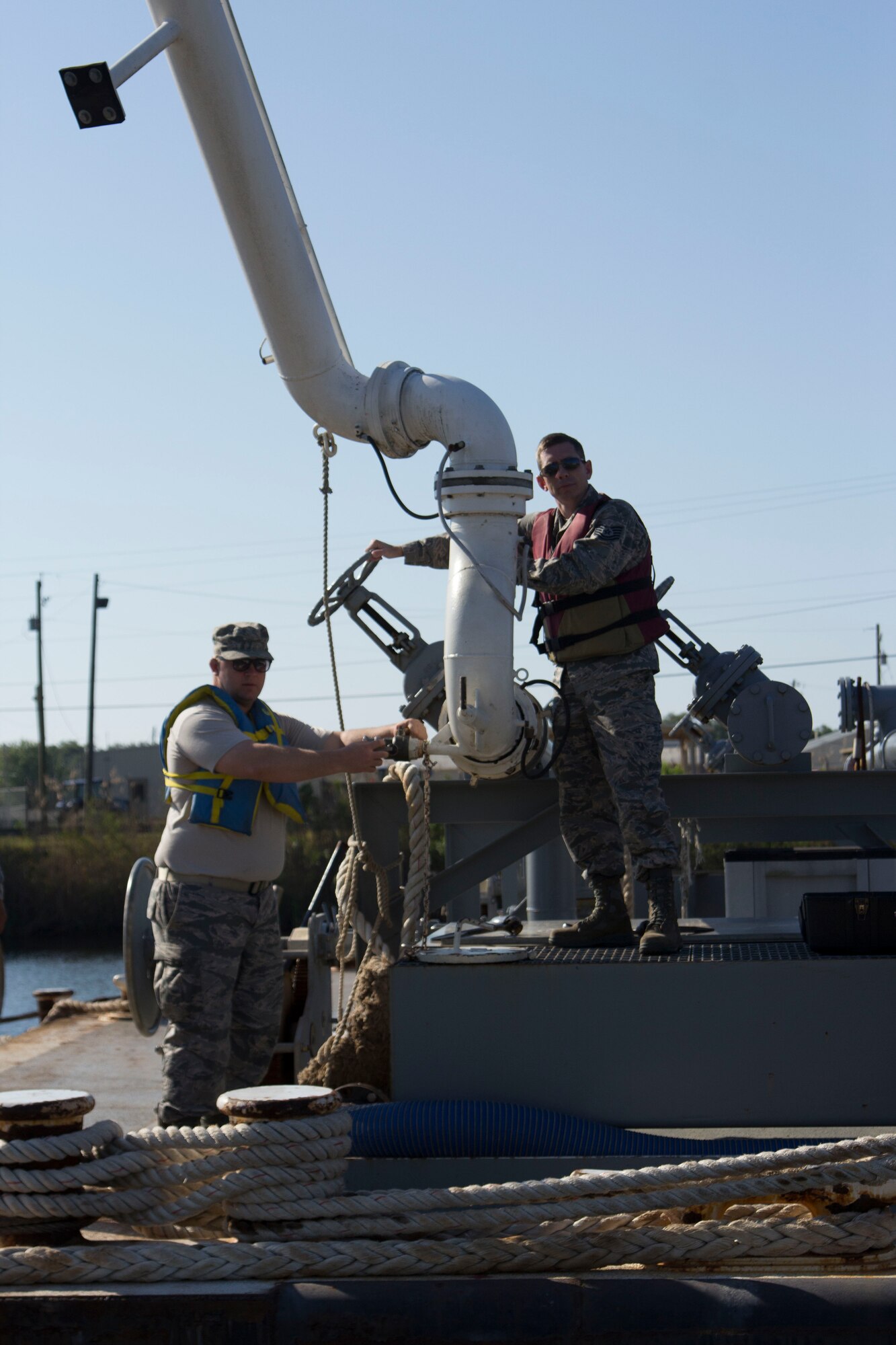 Tech. Sgts. Jordan Aggson and Max Miller, 442nd Logistics Readiness Squadron Petroleum Oil and Lubricant specialists, operate a valve to off-load one-million gallons of jet fuel from a barge at Eglin Air Force Base, Fla., during a deployment for training there May 6-20.  Fuel for Eglin's fleet of aircraft is delivered by sea, given the location of the base on the Gulf of Mexico.  Sixty-eight Citizen Airmen from the 442 LRS and 442nd Force Support squadron completed a two-week training tour at Eglin and Duke Field, Fla., to hone home-station and mission-readiness skills. 
