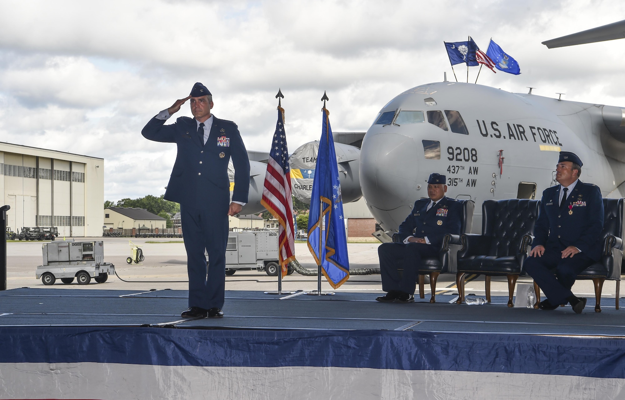 Col. Mark Harris, 437th Maintenance Group incoming commander salutes his new Airmen during a change of command ceremony at Joint Base Charleston, S.C., June 16, 2017. Harris came to Charleston after serving as chief of staff for the deputy chief of staff of Strategic Plans, Programs and Requirements at the Pentagon, Washington, D.C.   