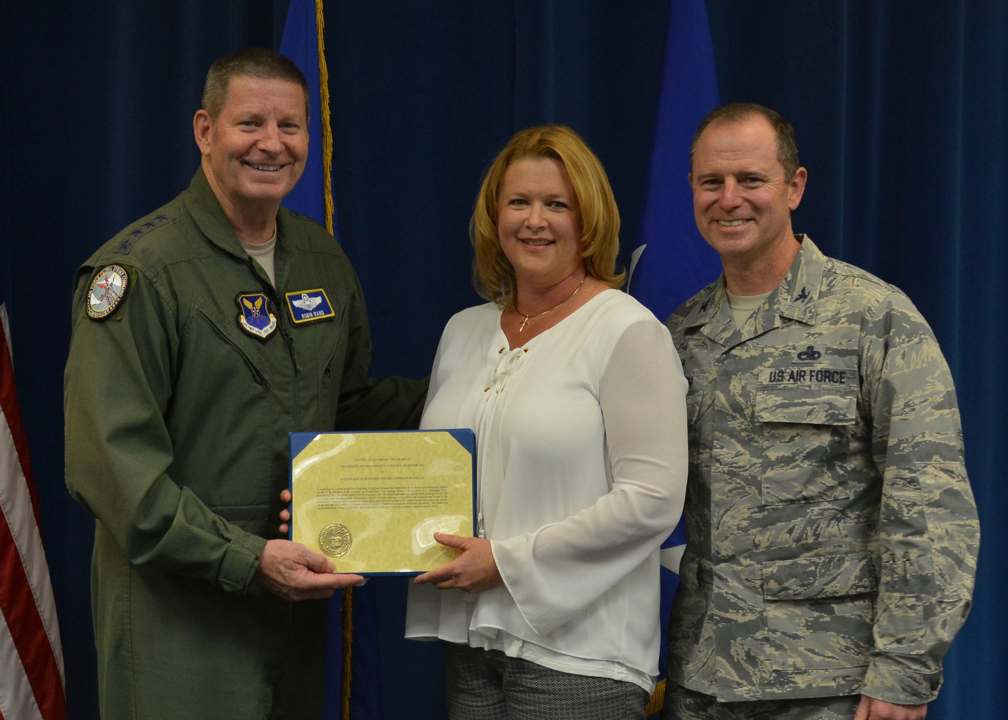 Gen. Robin Rand, Air Force Global Strike Command commander, presents the Air Force 2017 General and Mrs. Jerome O’Malley Award to Col. Eric H. Froehlich and his wife Stephanie during a ceremony at Kirtland Air Force Base, N.M. June 15. The Forehlichs will be invited to Washington D.C. later this year to officially accept the award.
(U.S. Air Force Photo by Senior Airman Bethany La Ville)