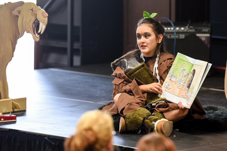 Kaitlyn Thomas, 9, reads a story aloud for the Summer Reading Program at Hurlburt Field, Fla., June 15, 2017. This year’s summer reading program theme is “Reading by Design” which encourages readers to learn about different types of architecture throughout history. (U.S. Air Force photo by Staff Sgt. Jeff Parkinson)